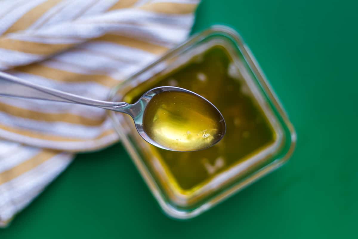 A spoonful of freshly made ghee that hasn't solidified yet.