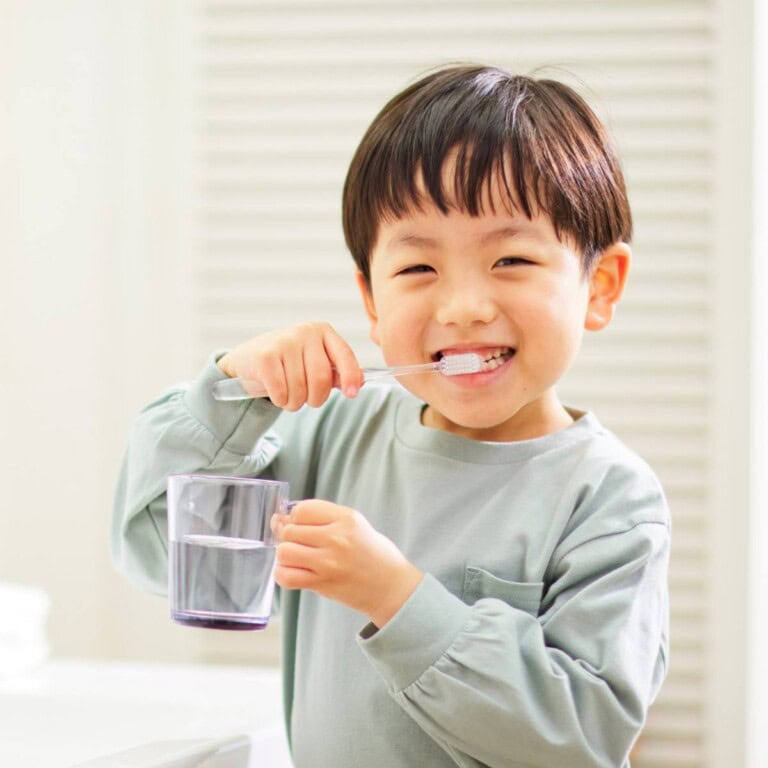 toddler brushing teeth