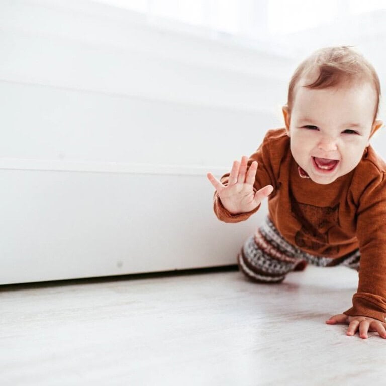baby crawling towards camera