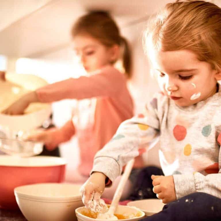 little girls helping to make cookies