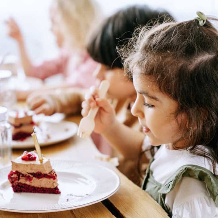 Kids eating cake.